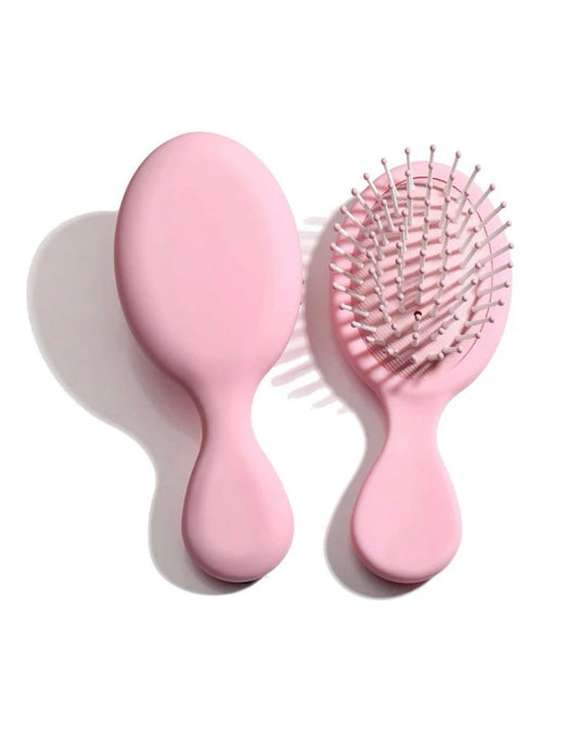 Petite brosse démêlante